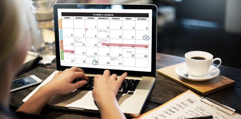 Image of a laptop with a calendar app open